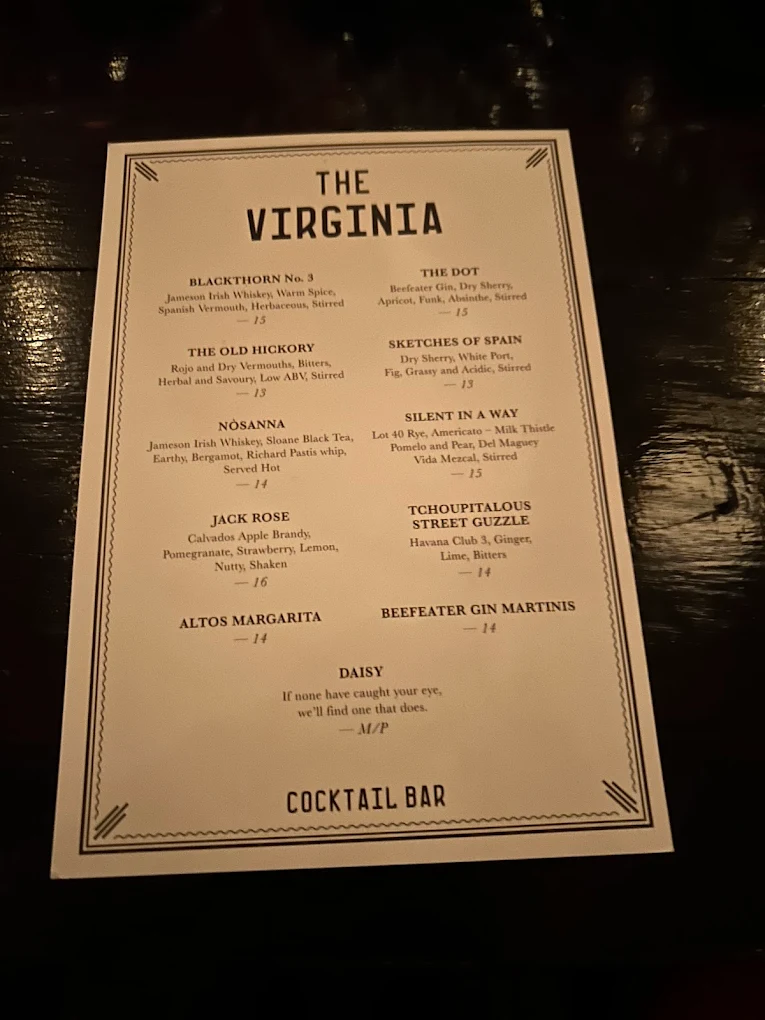 The Virginia cocktail menu card on the bar